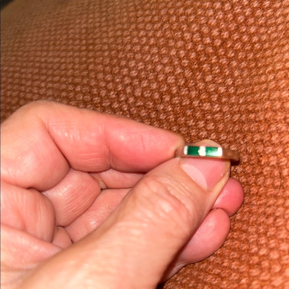 Green and silver women’s ring